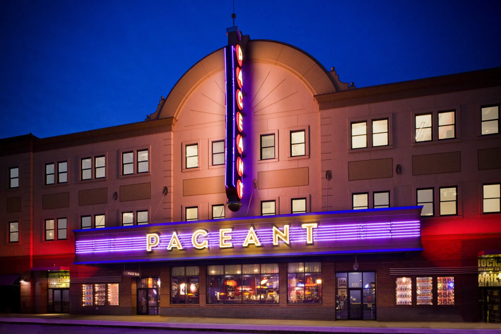 The Pageant's illuminated facade and marquee at night in the Delmar Loop.
