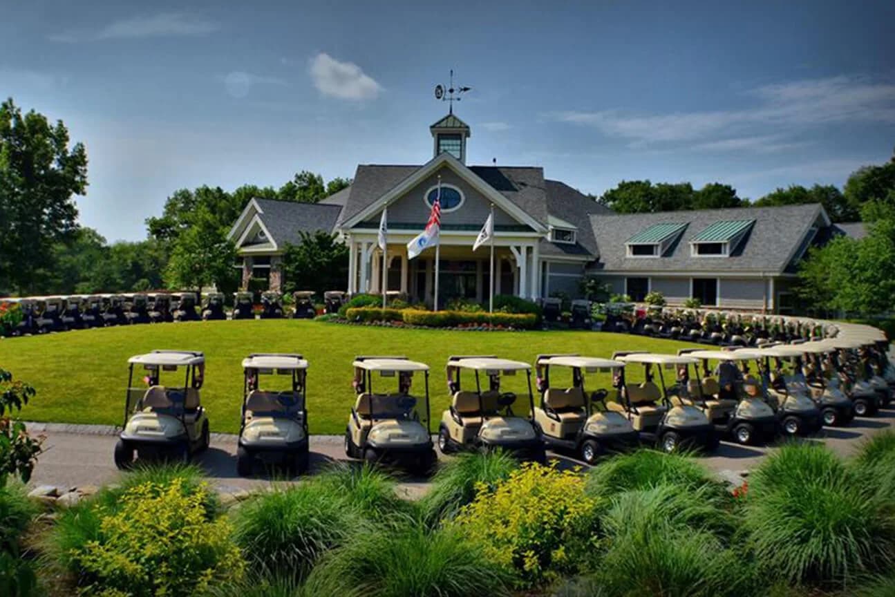 Clubhouse and golf carts at TPC Boston.