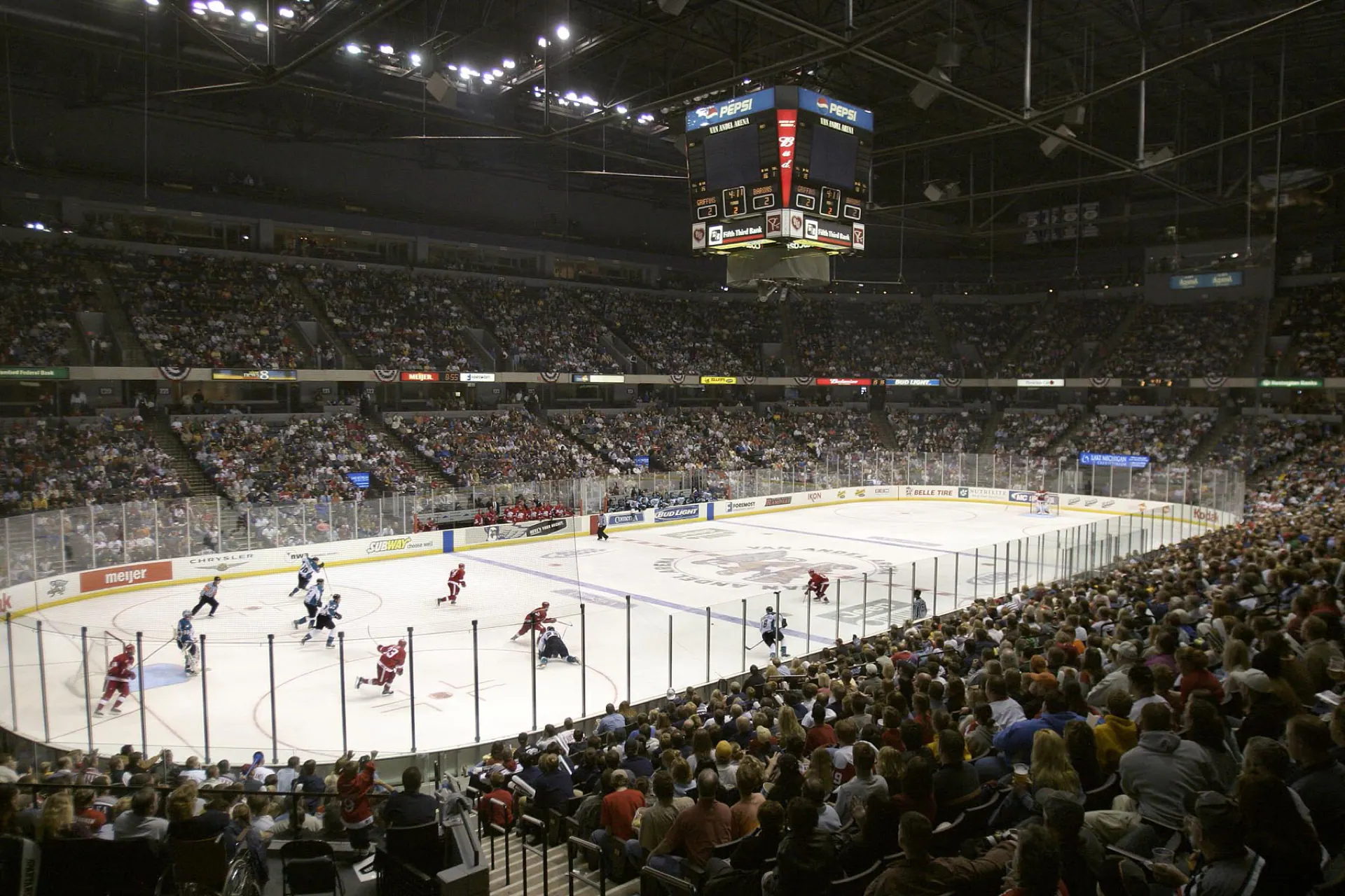A hockey game and crowd inside the seating bowl at Van Andel Arena.