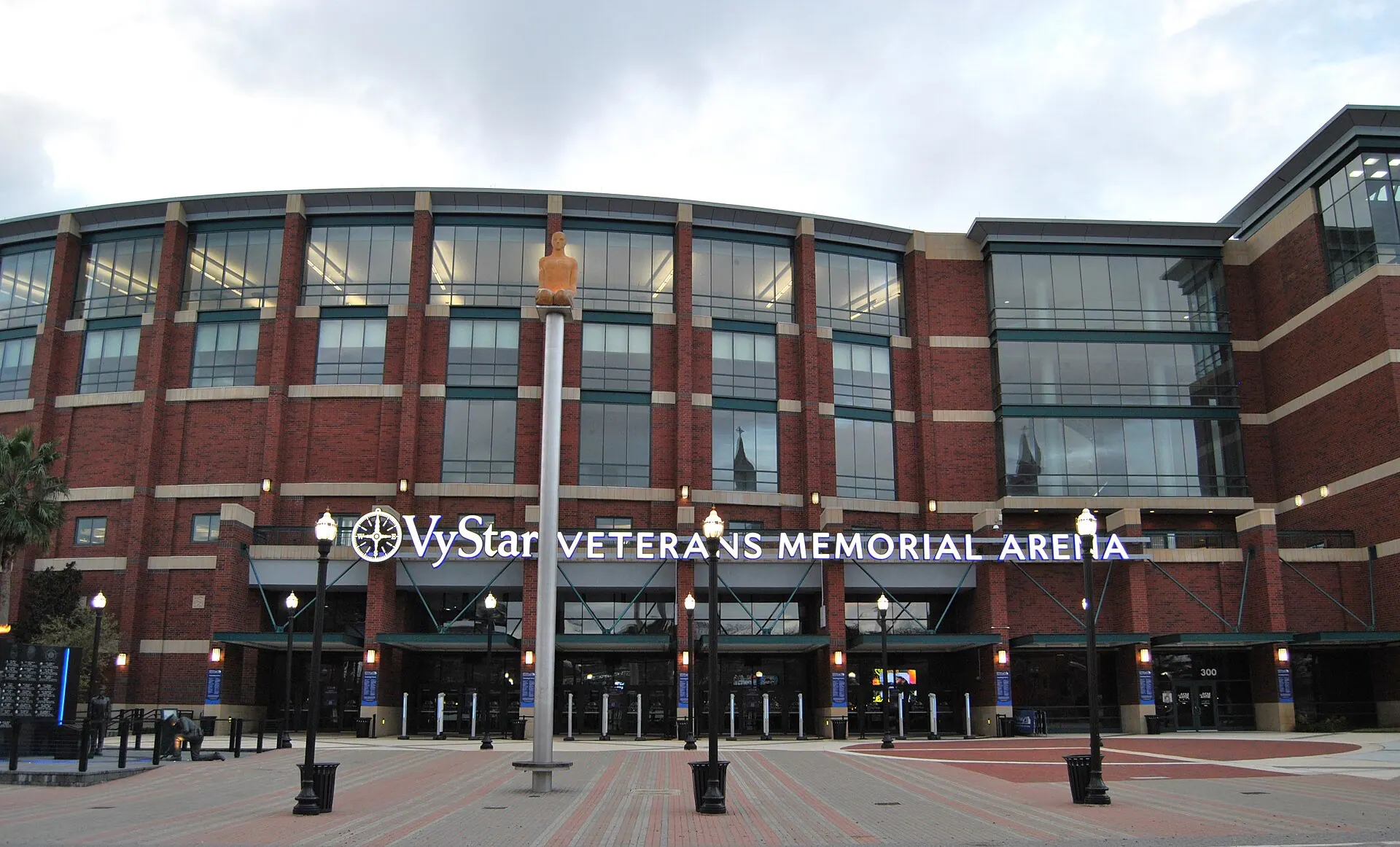 Front entrance and brick facade of VyStar Veterans Memorial Arena in Jacksonville.