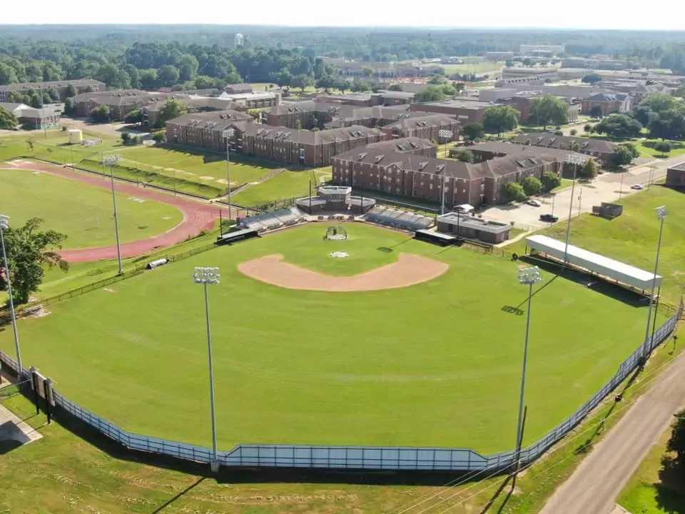 Wilbert Ellis Field’s complete natural-grass diamond, outfield fence, spectator bowl and surrounding Grambling campus in the official aerial collection. This actual historical photograph does not establish current parking permission or a numbered camera seat.